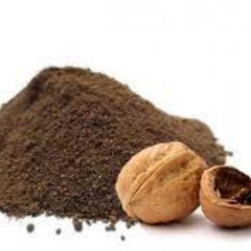 a pile of Juglans Regia dirt and a walnut