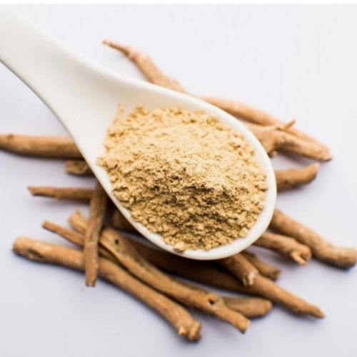 a spoonful of Hemidesmus Indicus powder on top of sticks